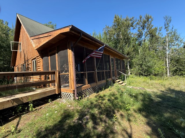 Shoreline “Cabin” at  25813 Carlisle Road