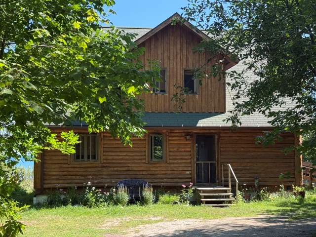 Shoreline “Cabin” at  25813 Carlisle Road