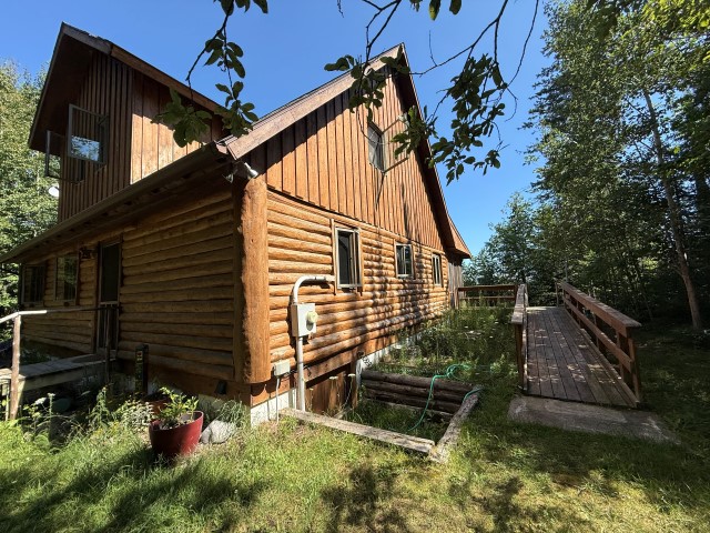 Shoreline “Cabin” at  25813 Carlisle Road