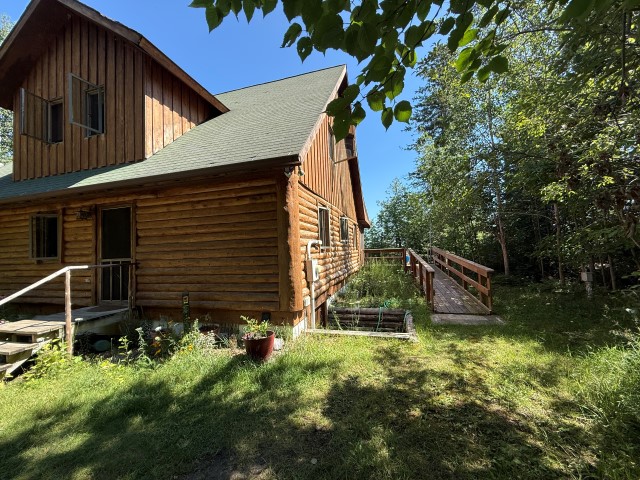 Shoreline “Cabin” at  25813 Carlisle Road