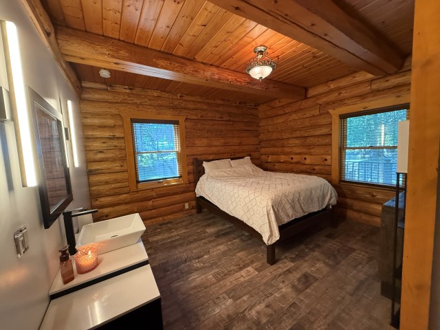 The Log Home “Shanoule” – 27715 Paid een Og’s Road
